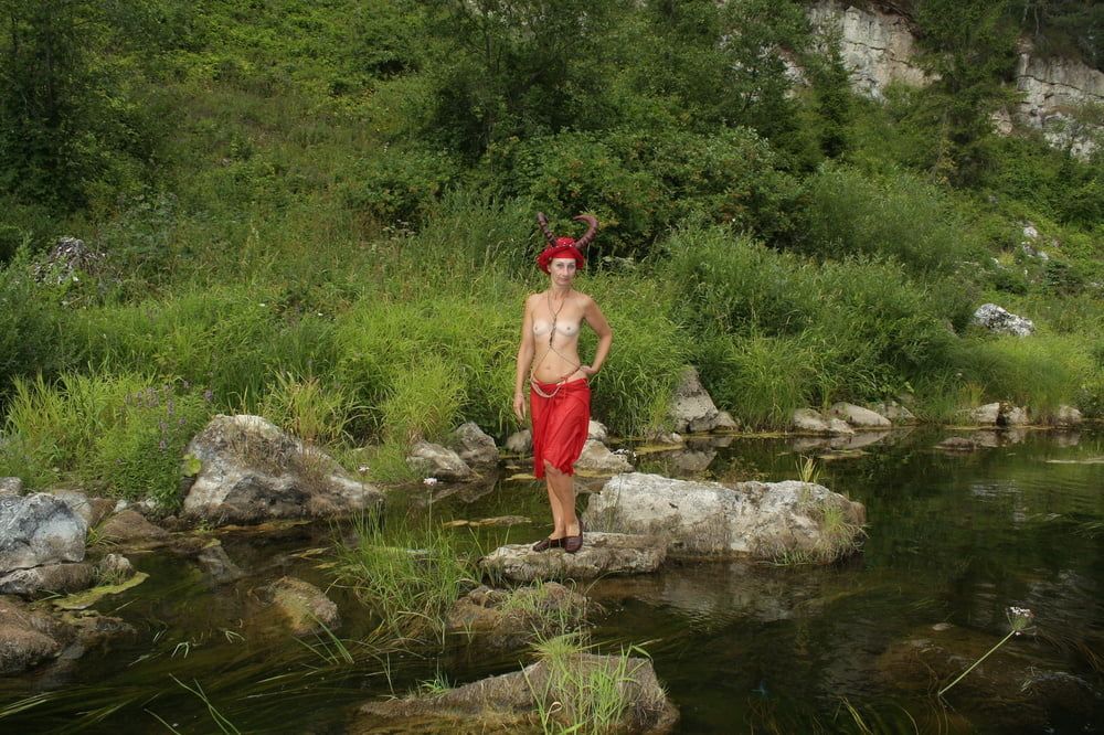 With Horns In Red Dress In Shallow River #17