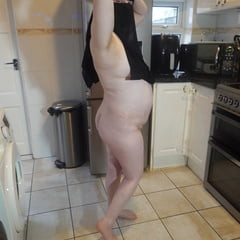 Posing fully nude in Niqab
