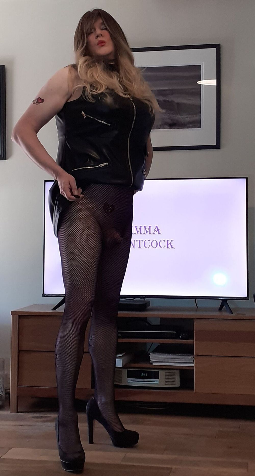 crossdressed in black leather dress #10