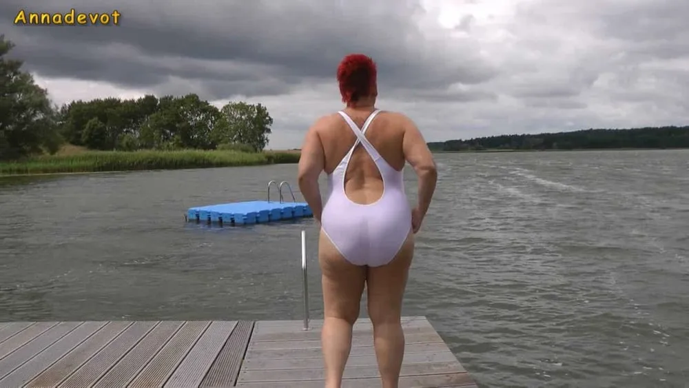 In WHITE SWIMSUIT in the lake