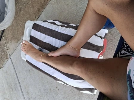 my girls sexy legs and feet in the sun         