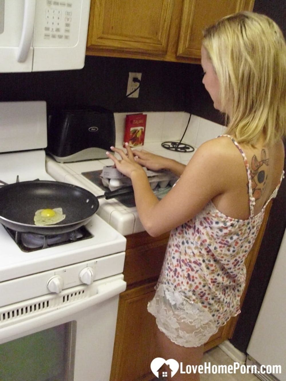 My wife really enjoys cooking while naked #13