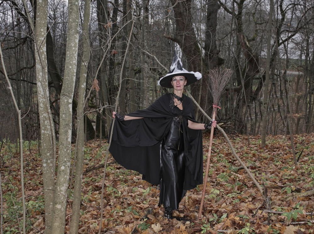 Witch with broom in forest #50
