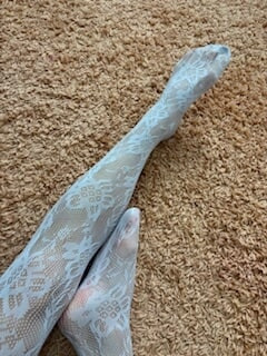 Long slim legs in a cute black stocking and heels