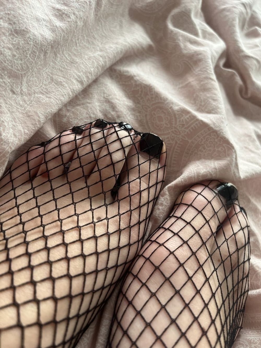 Foot with fishnet socks  #7