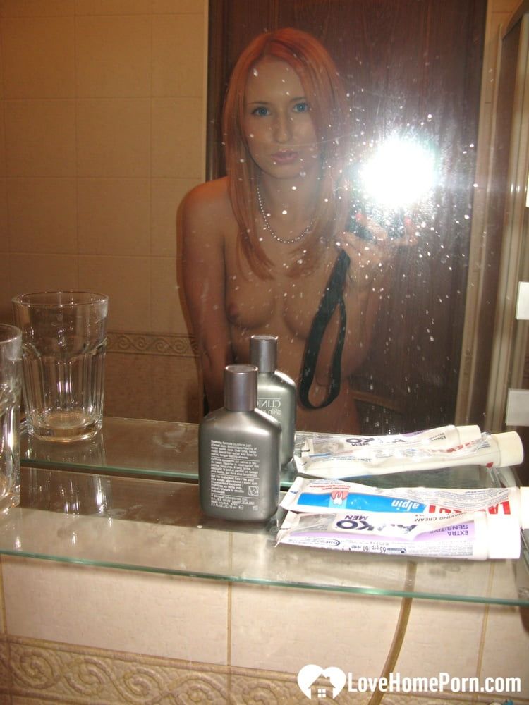 Redhead taking some hot selfies before showering #25