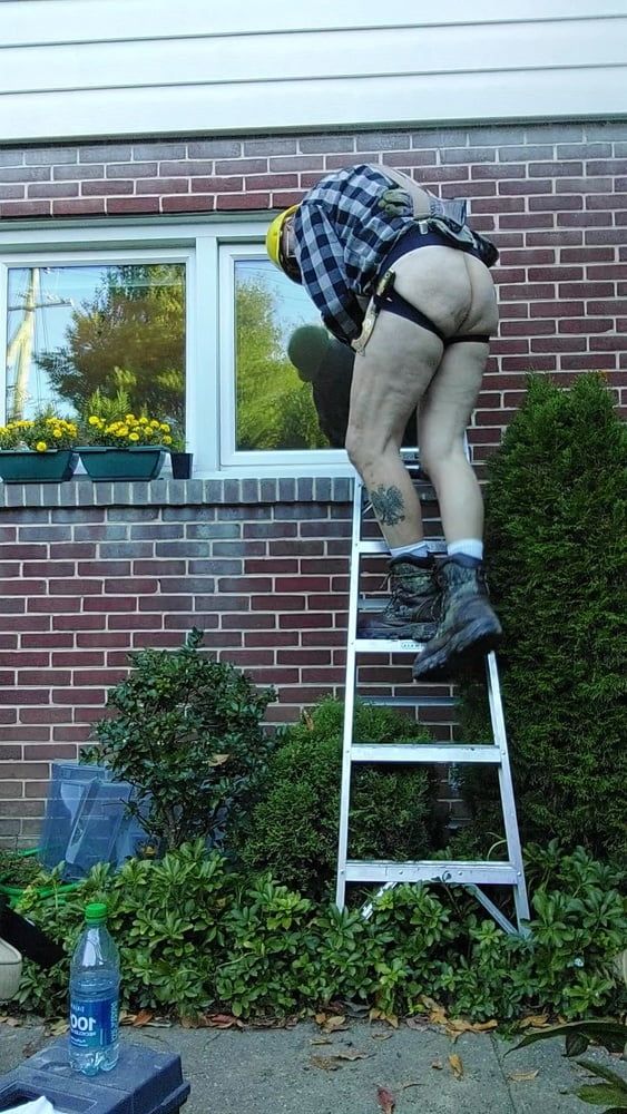 Construction dad inspecting windows #6
