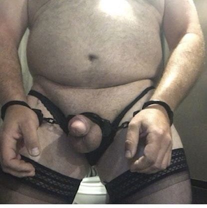 Brandon Hegsted wearing thigh highs, panties and handcuffs #3