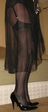 long luscious legs encased in sheer black silk ff nylons         