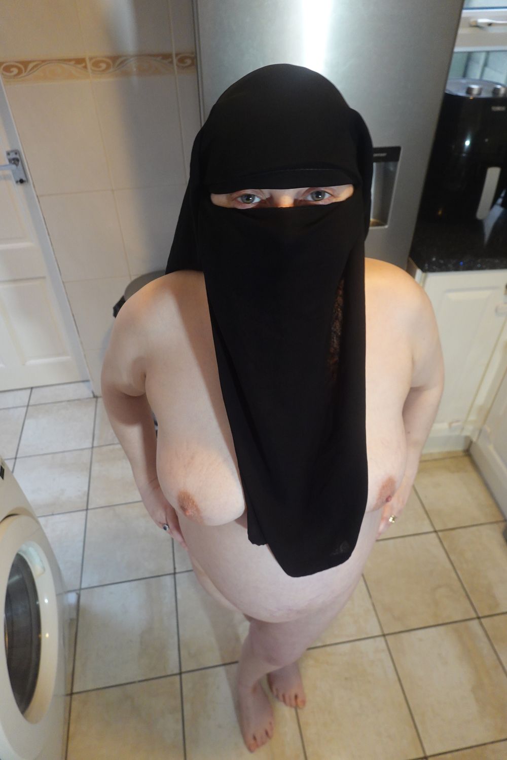 Posing fully nude in Niqab #33