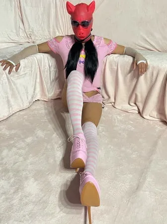 sissy wearing a pink dress heels and chastity cage pt           