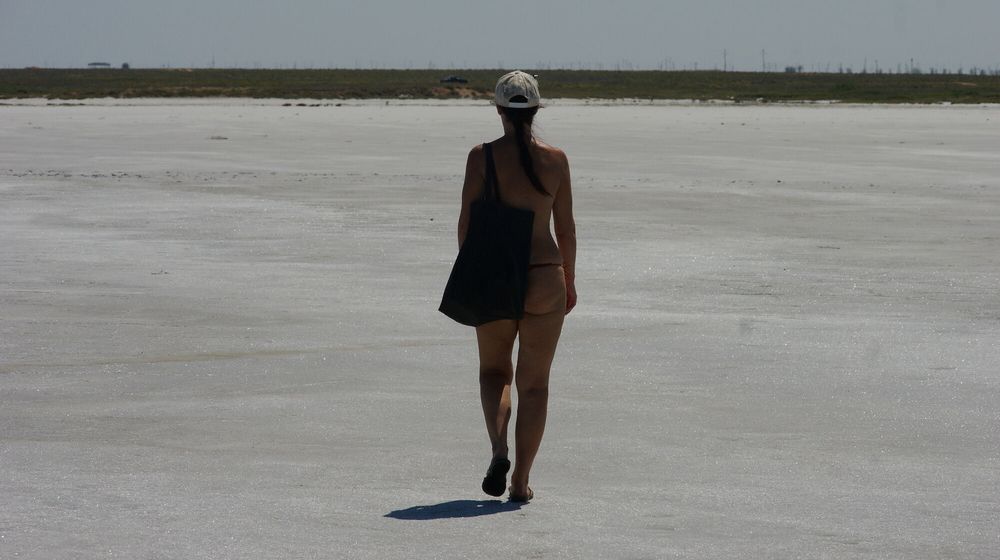 Standing naked on the salt of the salt lake Elton #36