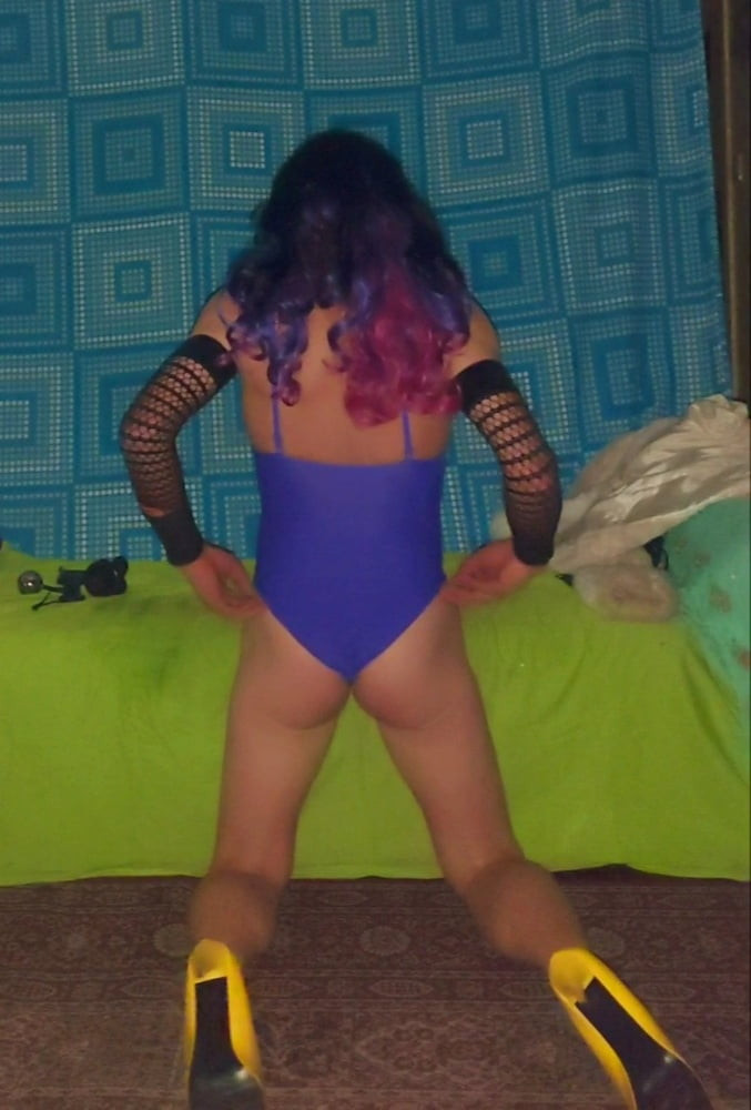 Purple swimsuit and wand album #41