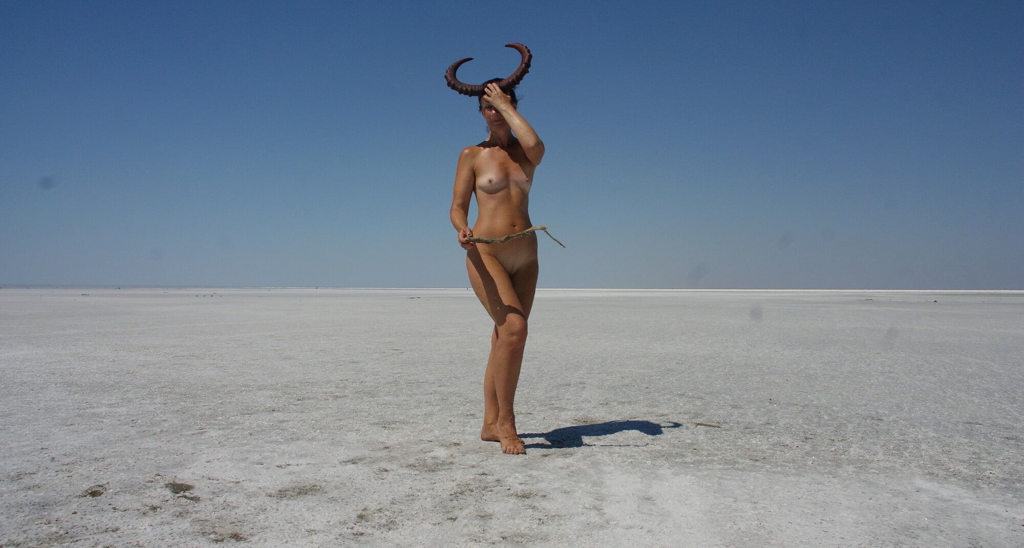 Standing naked on the salt of the salt lake Elton #20