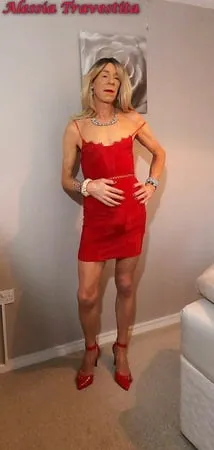    alessia travestita in red velvet dress         