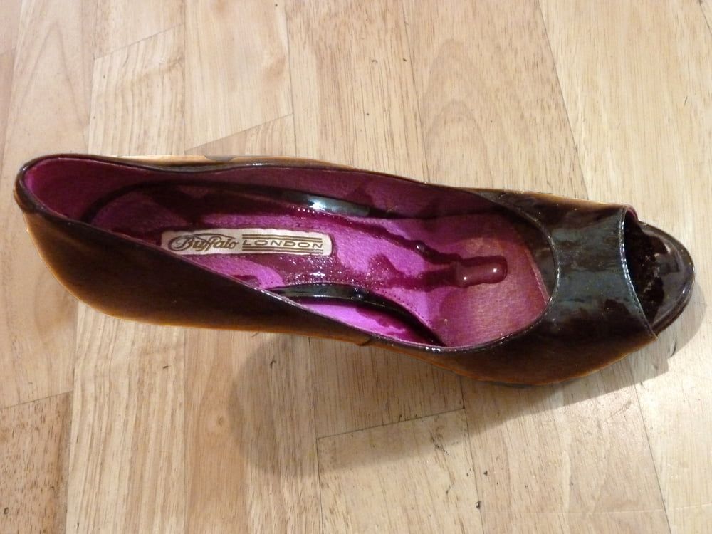wife's purple Buffalo heels