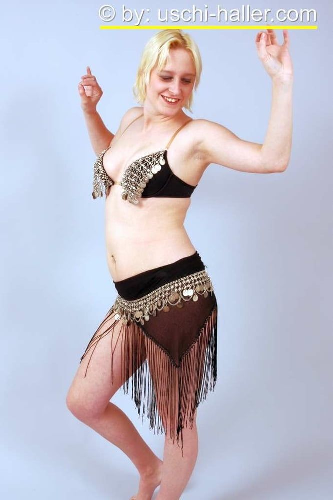 Photo shoot with blonde cum slut Dany Sun as a belly dancer #10