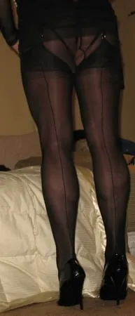 long luscious legs encased in sheer black silk ff nylons         