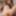 Cute teen Miya shows her shaved pussy on the sofa