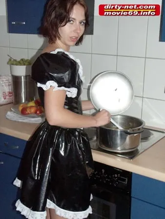 teen laura as a maid in the kichen         