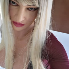Silicone Tranny in PVC miniskirt and high heels