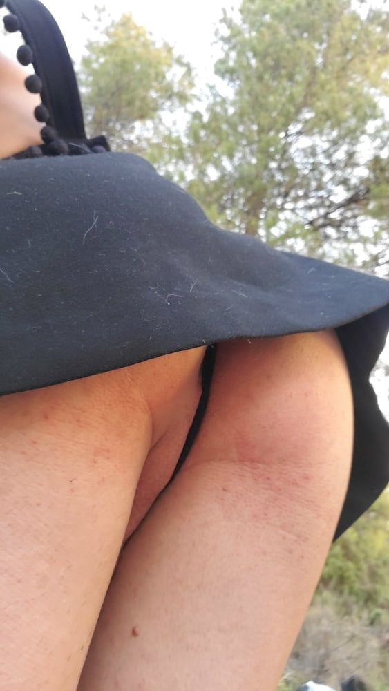 Little bitch shows her ass in the woods