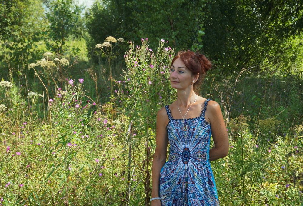 In blue dress in field #3