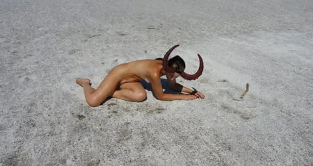 lying naked on the salt of the saltlake elton russia         