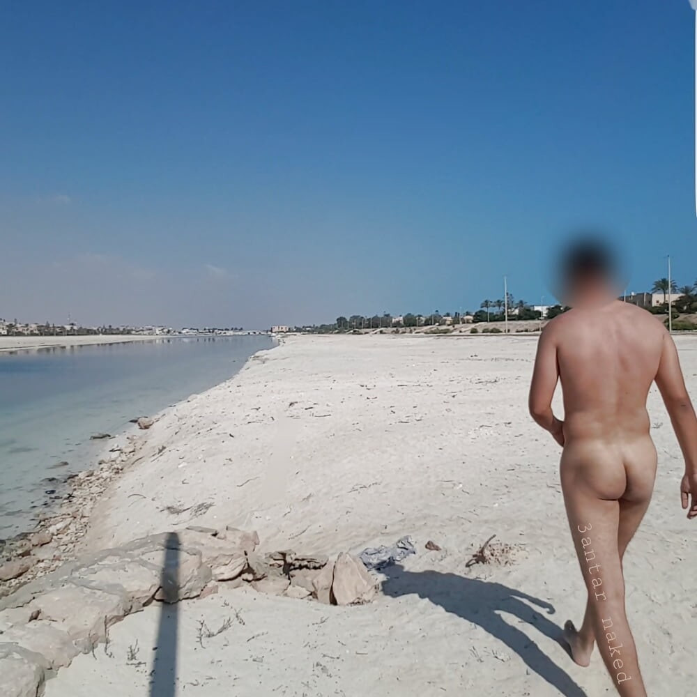 3antar walking in public beach