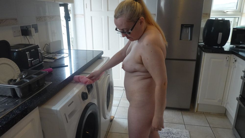 Naughty housewife cleaning in the kitchen #4