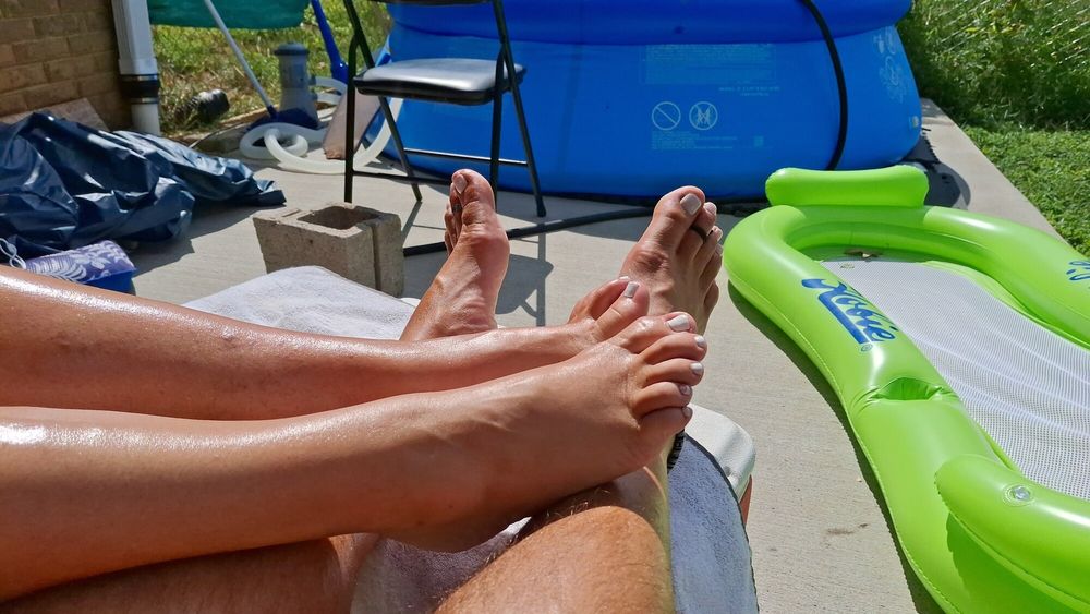 Tanning our legs and feet #14