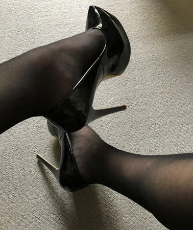 black tights heels close up           