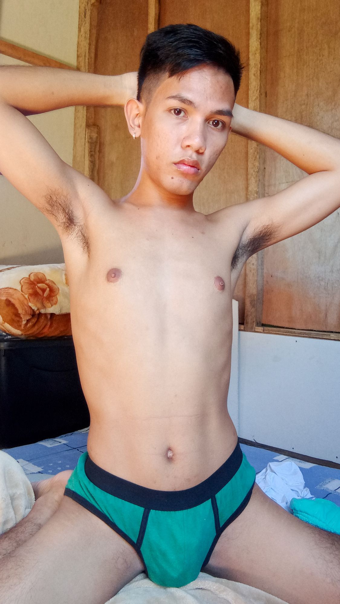 Muscled asian twink spreads his furry legs in bed #4