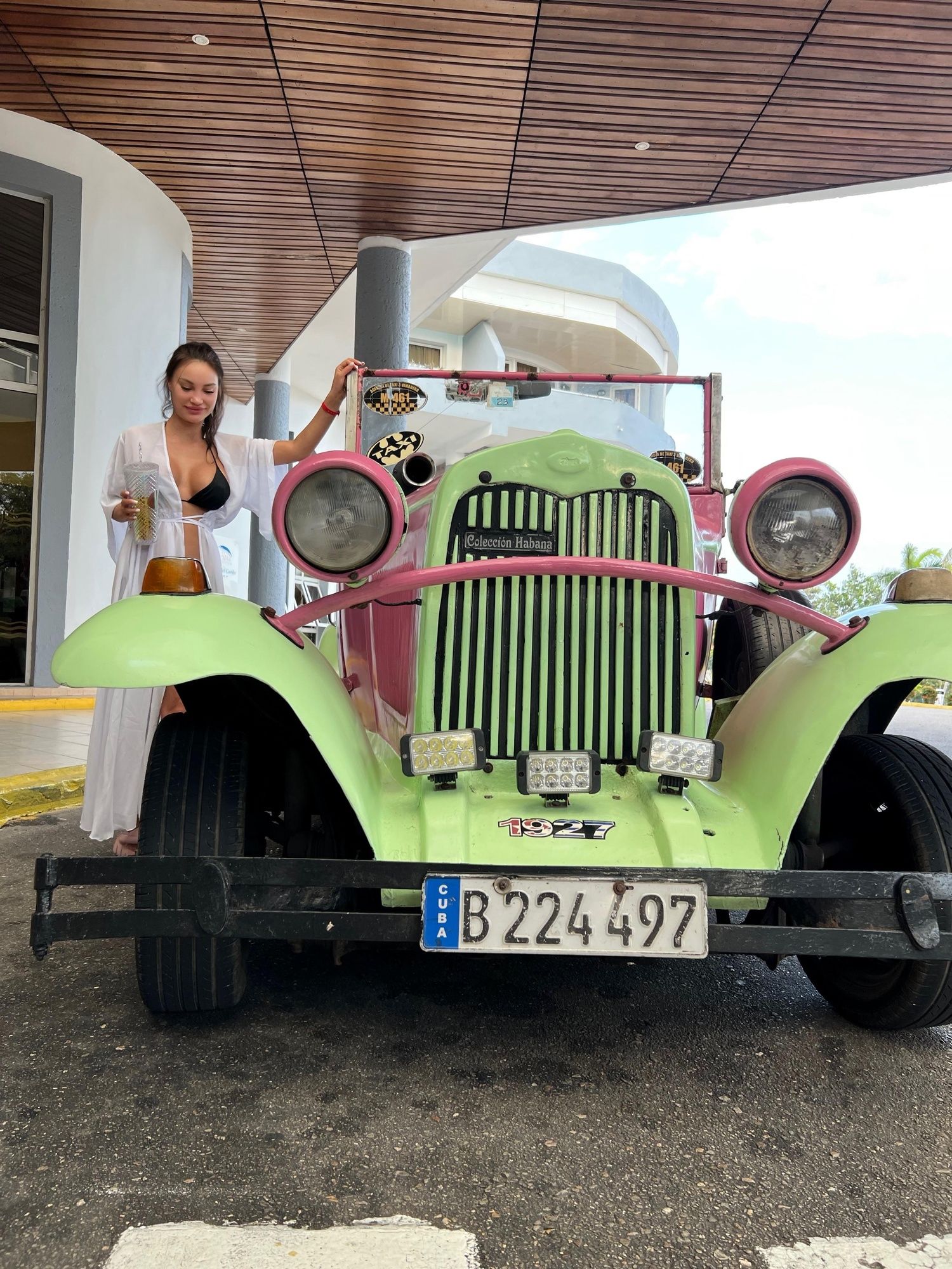Monika Fox Poses Near A Cuban Retro Car