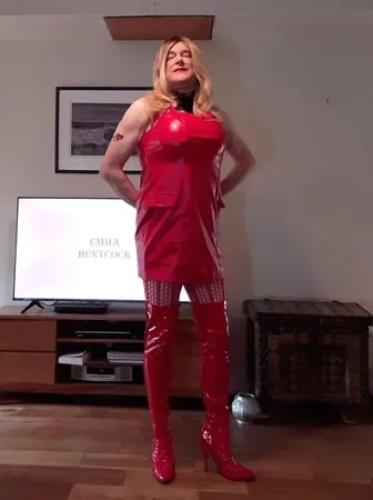 sissy in red lingerie and thigh boots         