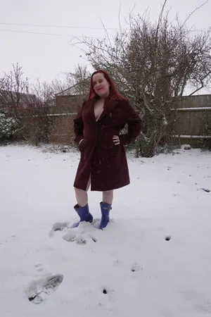 pregnant flashing naked in the cold snow         