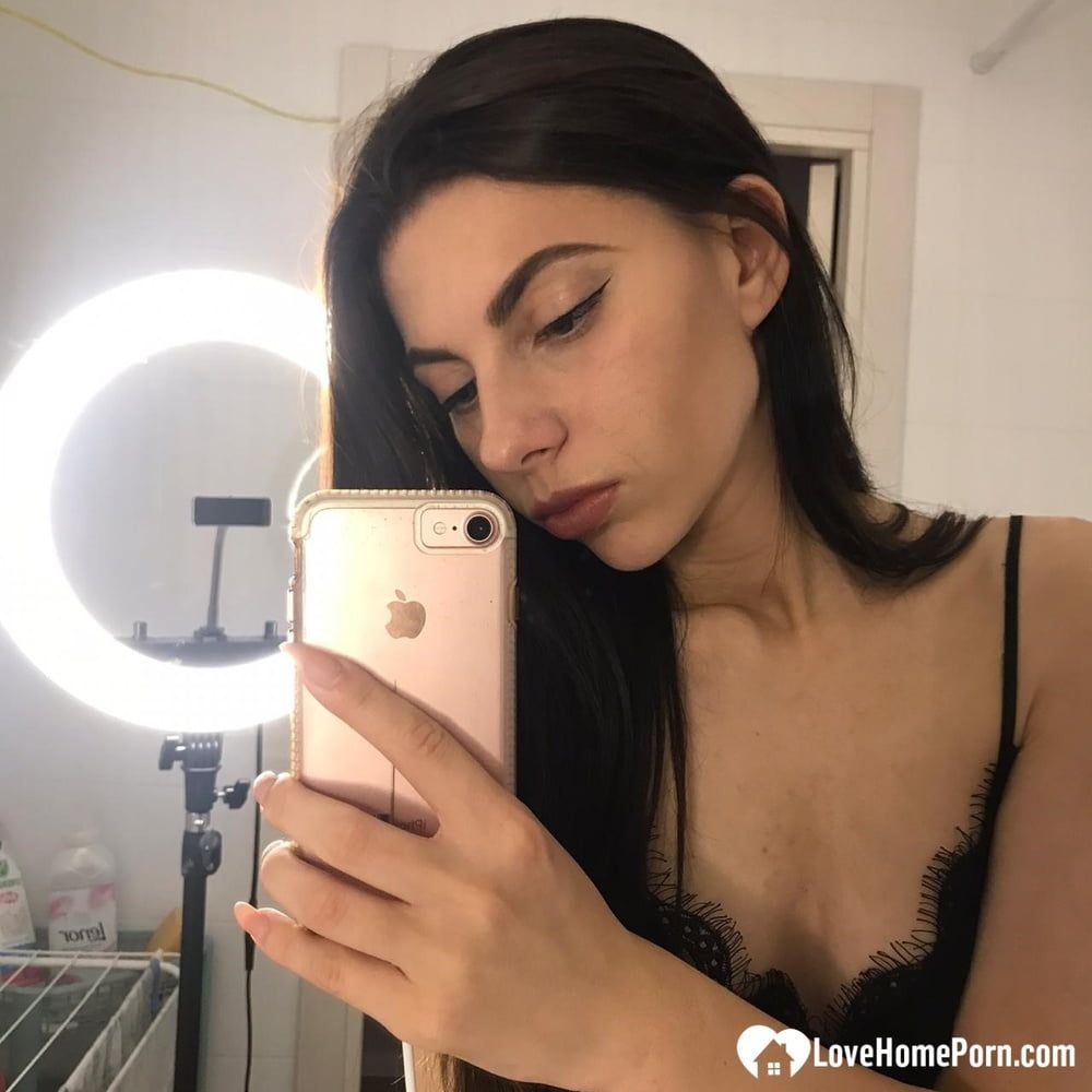 Hot schoolgirl reveals her tits in the mirror #3