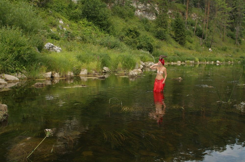 With Horns In Red Dress In Shallow River #15