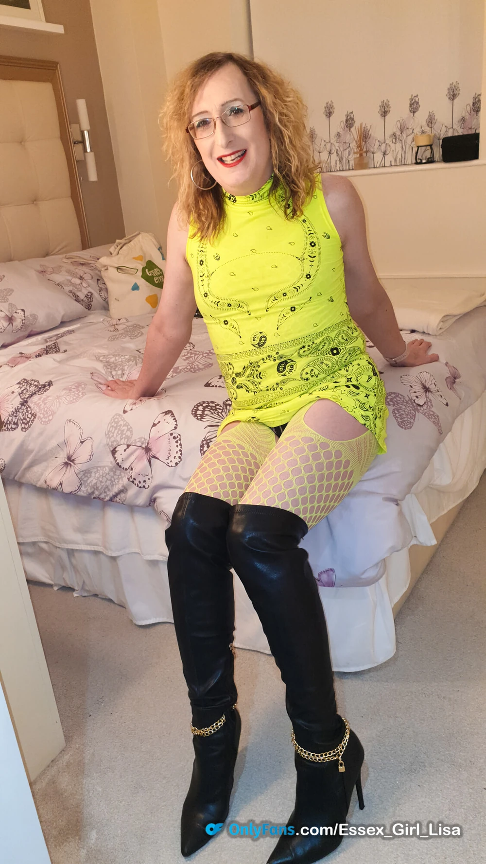 Essex Girl Lisa in neon yellow dress and black knee boots #13