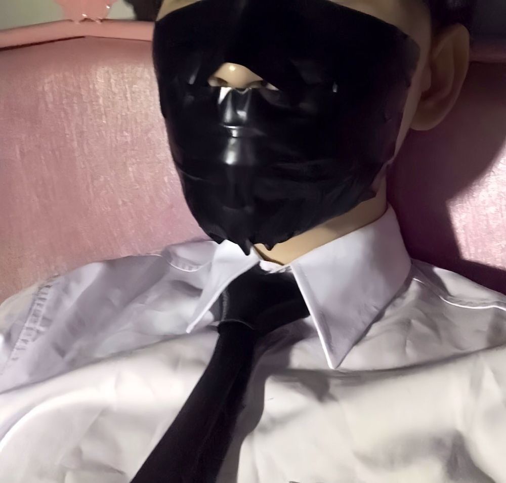 Wearing a white shirt and shiny black tie, gagged with duct  #21