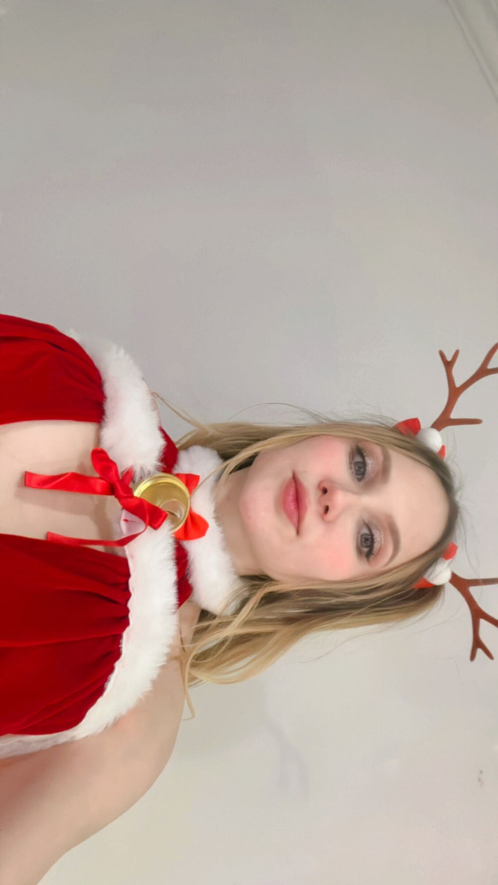 my sexy photoshoot in a reindeer costume. standing breasts