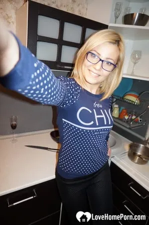 amateur blonde with glasses exposes her naughty side         