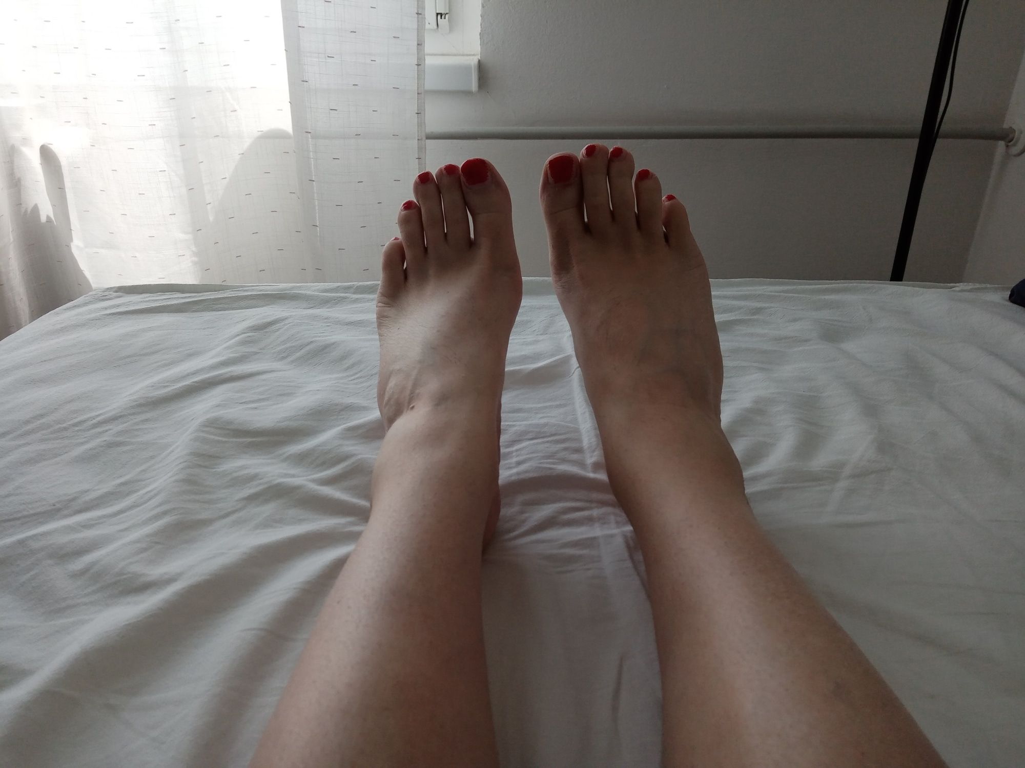 MILF tranny shows off her feet with red painted toes #3