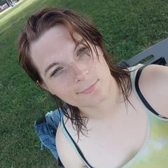 Me in a green tank top and grey panties 