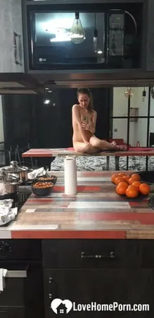 taking naughty selfies with a couple of oranges         