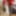 Red corset, stockings, heels, plugged and playing stills #18