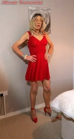    alessia travestita in flirty red dress         