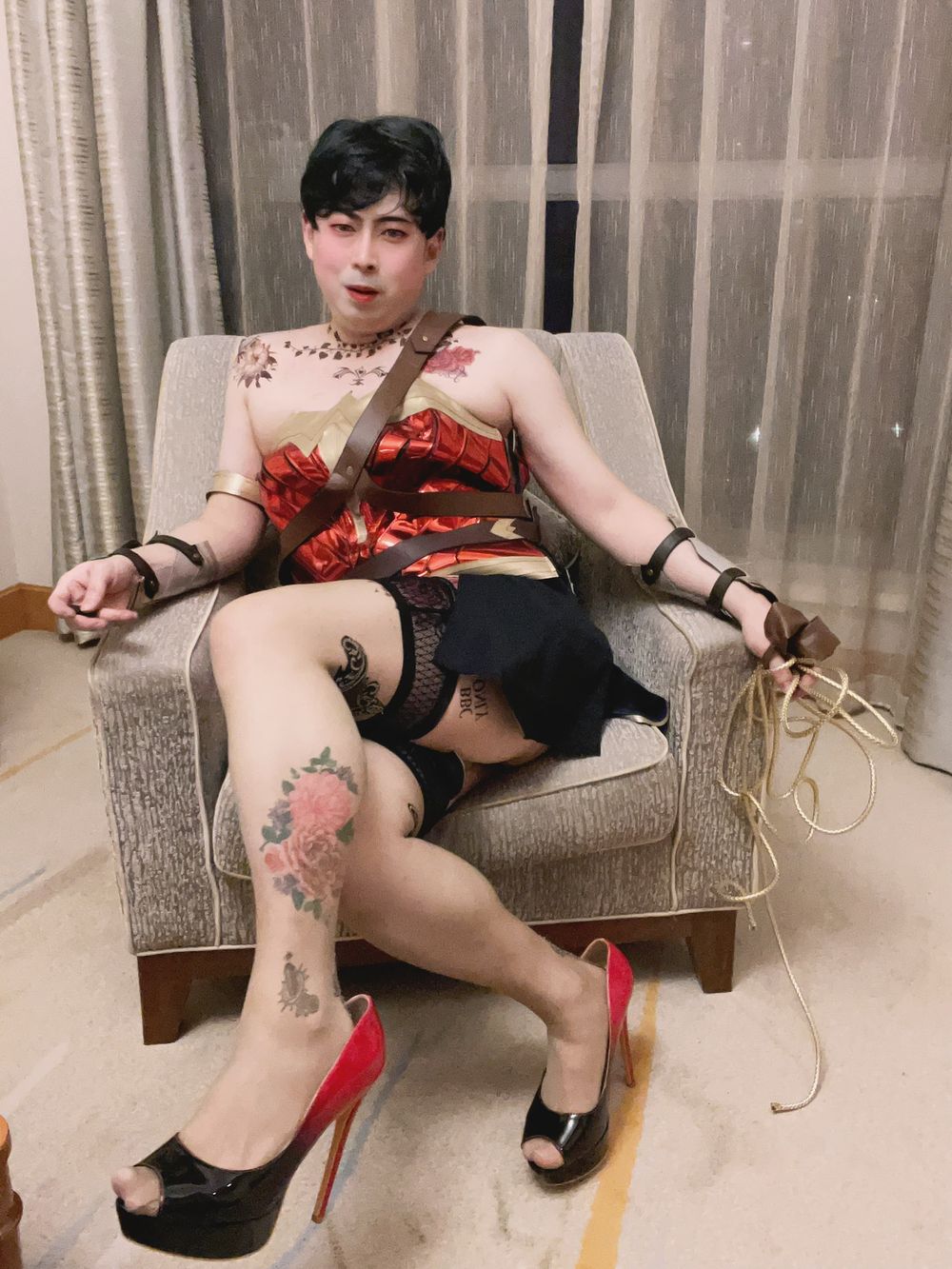 Asian sissy slut in wonder woman custome with tattoo #11