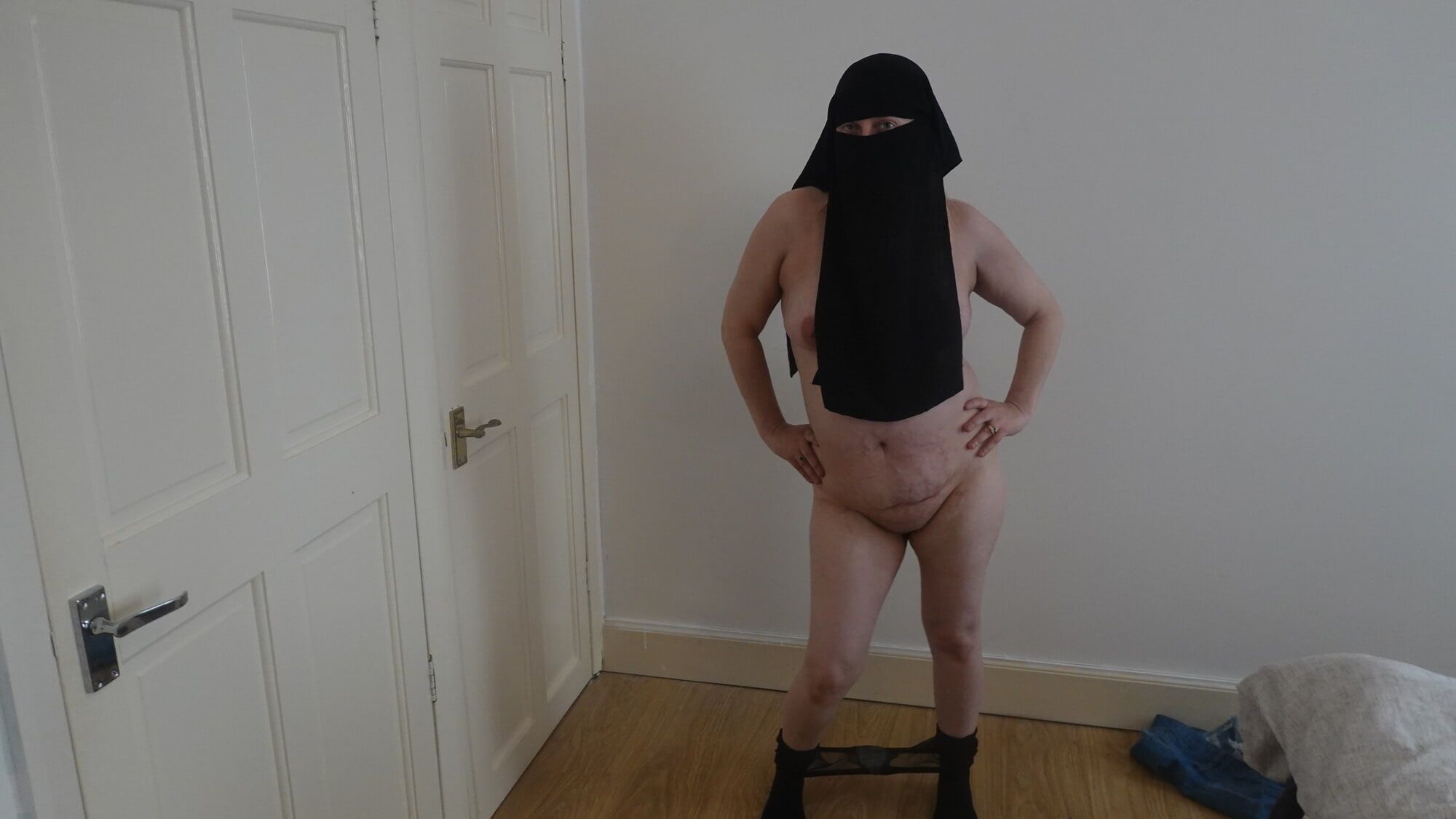 Wearing Shorts and pantyhose in Niqab  #29