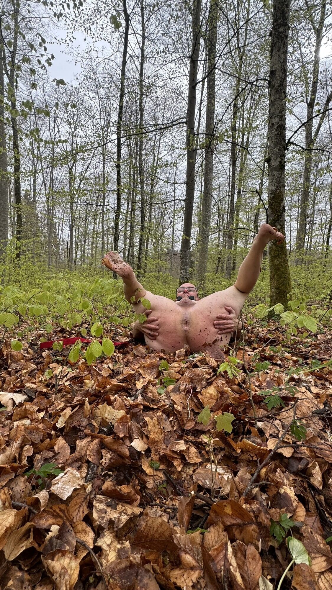 Slave whore naked in the forest